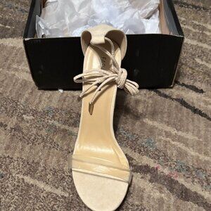 Elegant Beige Heels with Clear Strap
